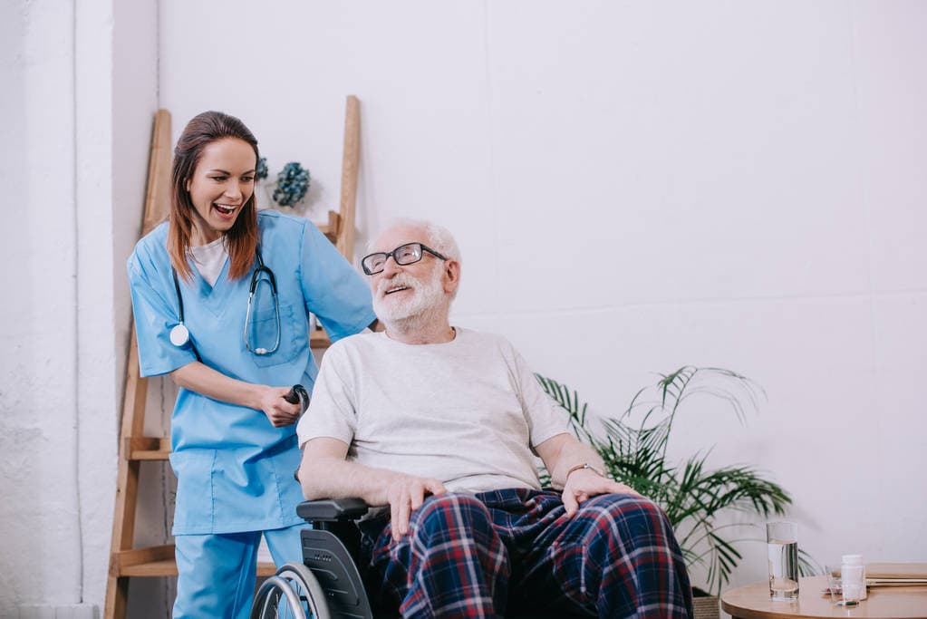 A senior patient receiving care support