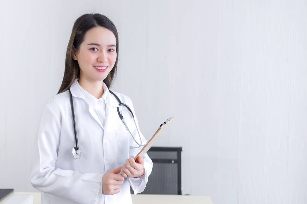 A clinician reviewing care information